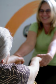 Physical therapist working with a patient.